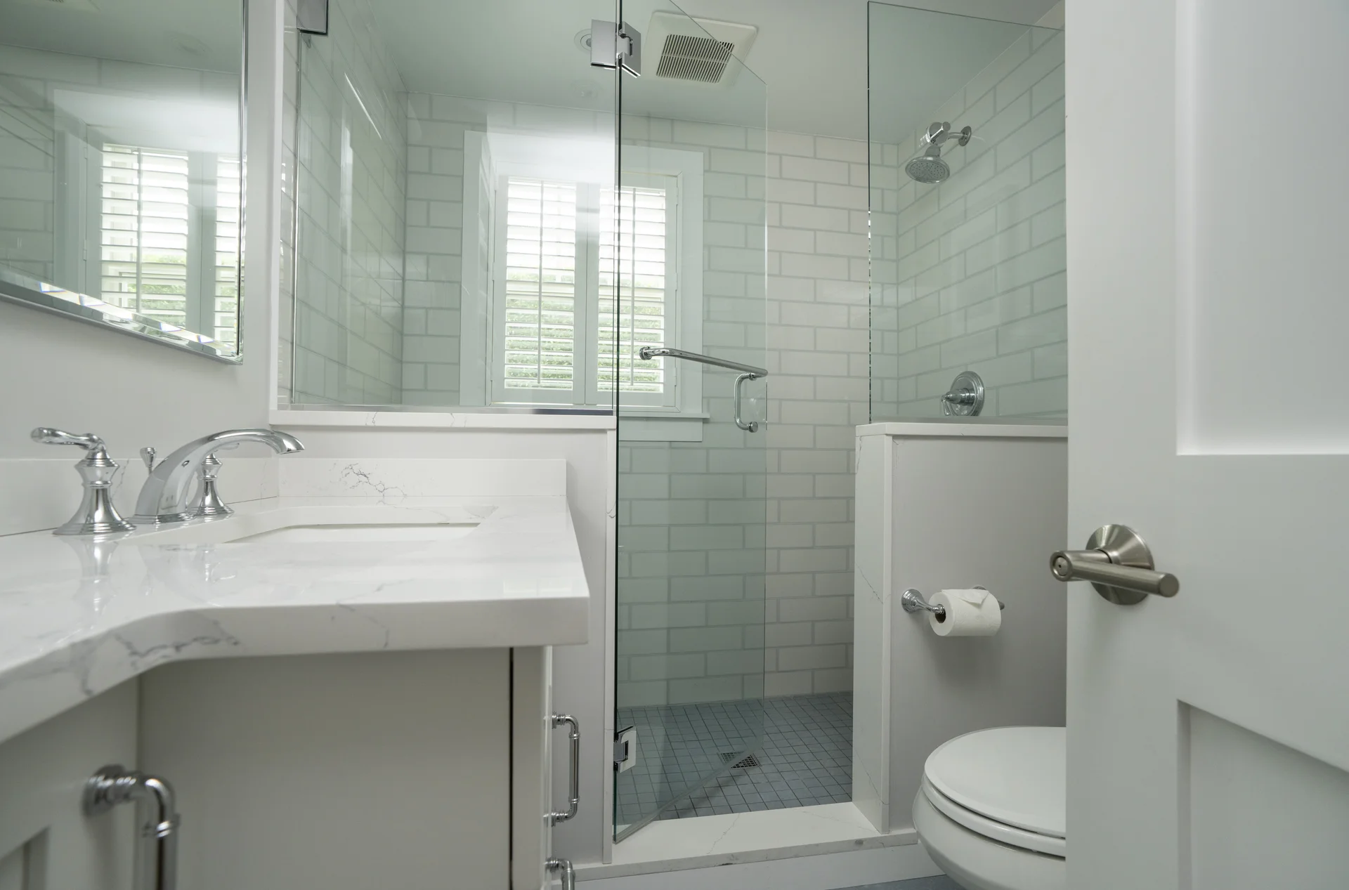 Bathroom with classic white subway tile in Nantucket home