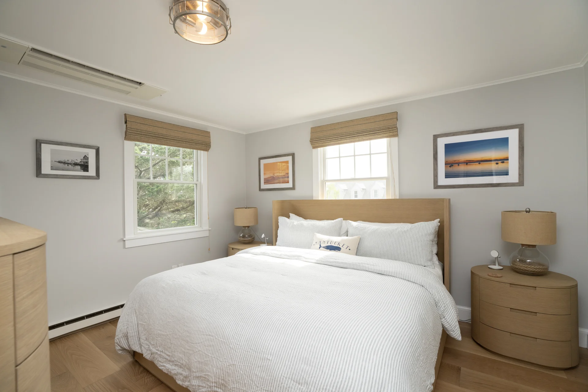 Bedroom with custom wood furniture in Nantucket home