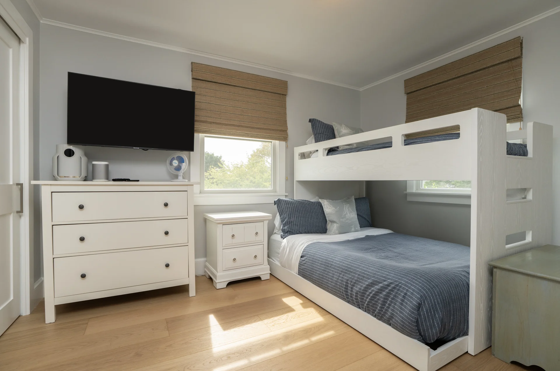 Kids bedroom with custom bunk beds in Nantucket home