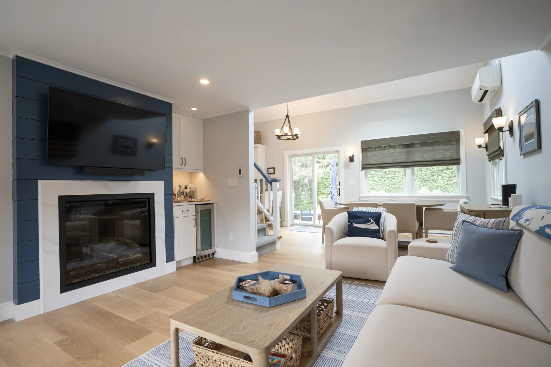 Living room with custom fireplace feature in Nantucket renovation