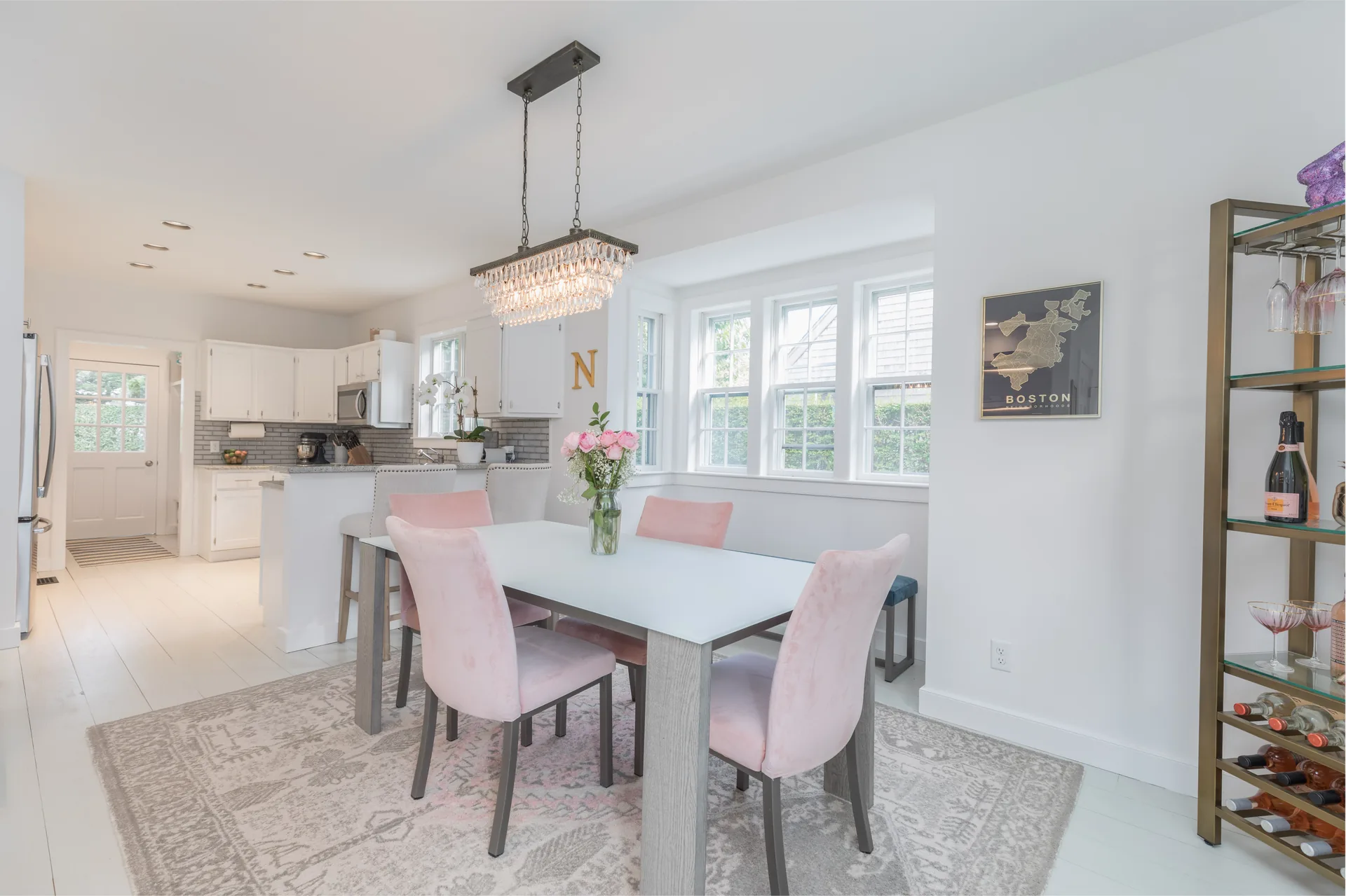 Dining area with Nantucket map art and built-in wine rack