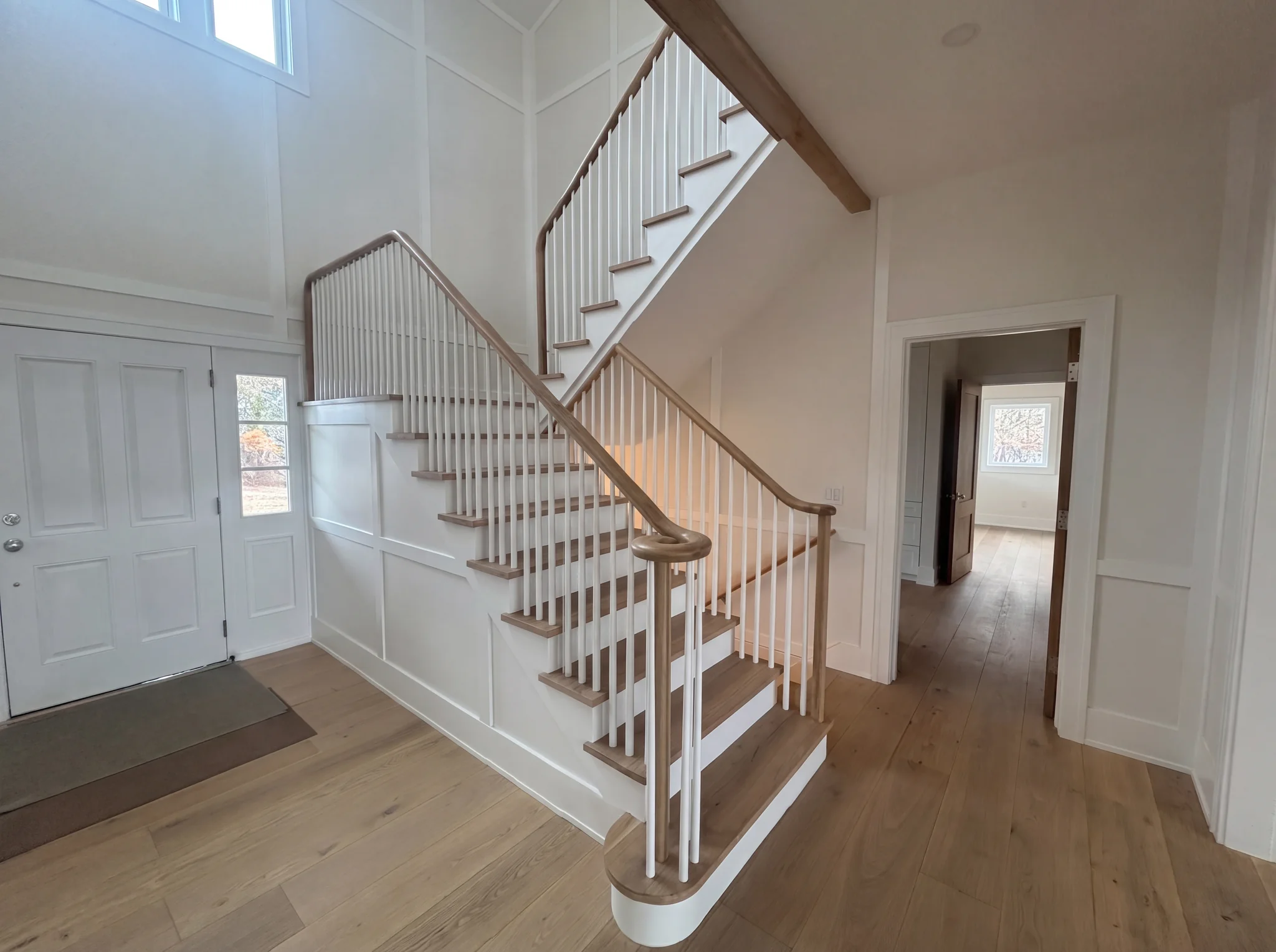 Custom staircase entry detail at North Pasture Lane