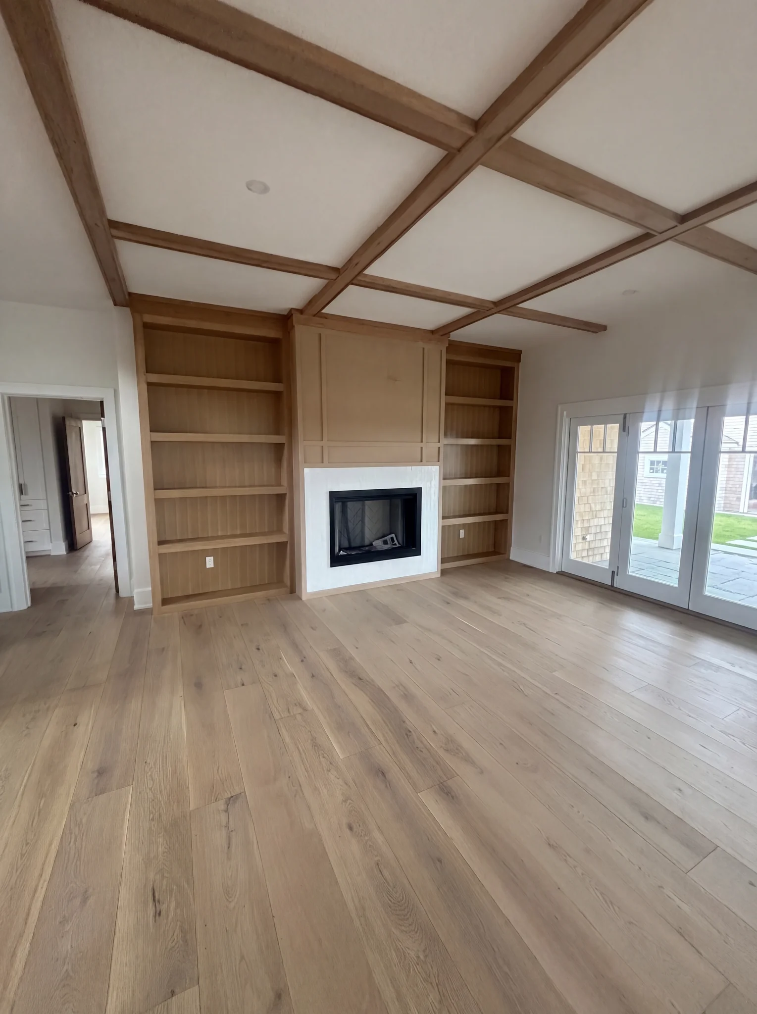 Fireplace shelving and ceiling detail at North Pasture Lane