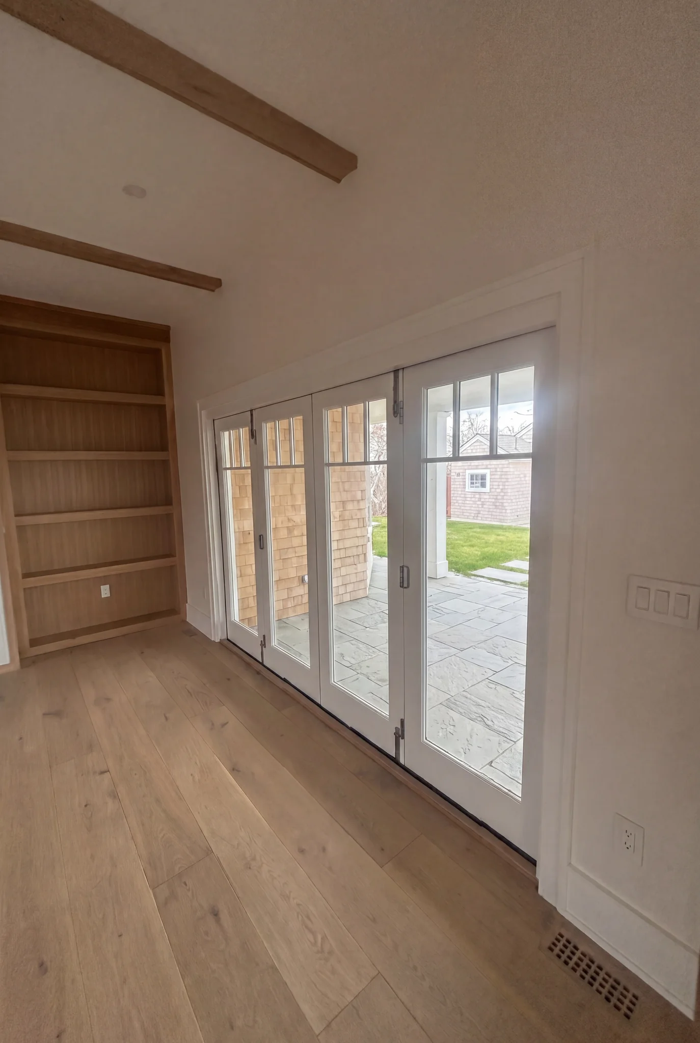 Living room sliding doors and new flooring at North Pasture Lane